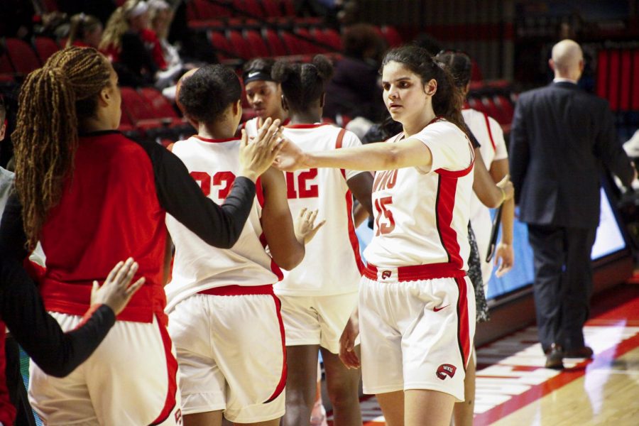 Raneem Elgedawy high-fives her teammates coming off the court after WKU’s game against Florida Atlantic on Thursday, Jan. 30. The Toppers won 68-59 in Diddle Arena.