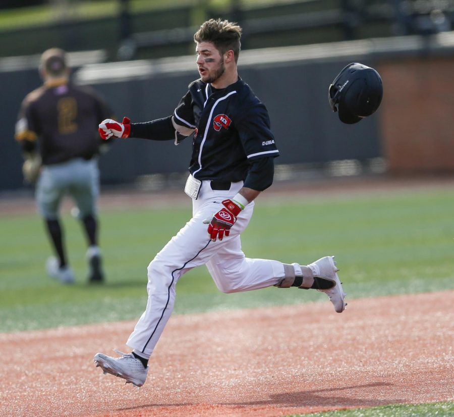 WKU%E2%80%99s+Ray+Zuberer+III+%2813%29+loses+his+helmet+while+running+to+second+base+against+Valparaiso+at+Nick+Denes+Field+on+Feb.+15%2C+2020.+WKU+won+9-3.