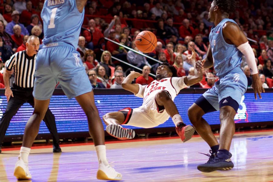 Sophomore guard Taveion Hollingsworth hits the deck during WKUs loss to Florida International Thursday in Diddle Arena. Hollingsworth had 14 points in the loss. 