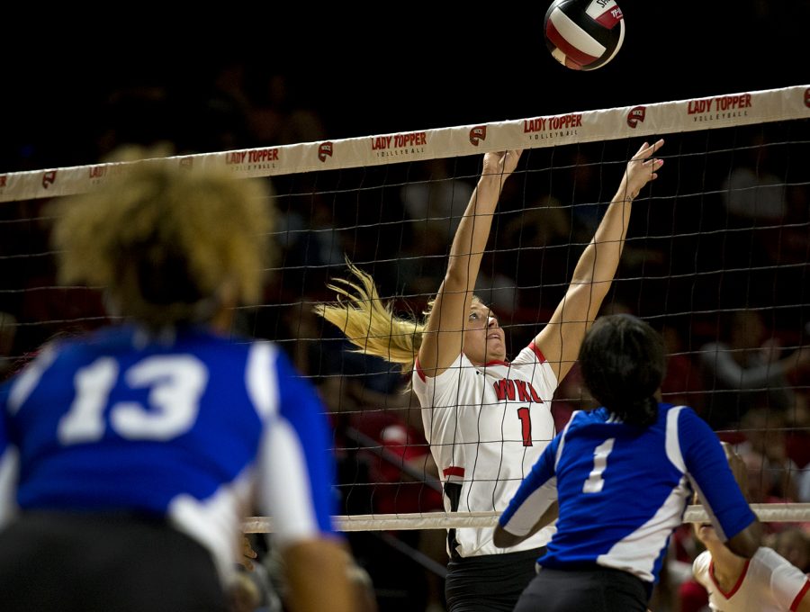Senior Jessica Lucas sets the ball to a teammate during a game against Tennessee State Tuesday, Aug. 29, 2017 in E.A. Diddle Arena. WKU won 3-0.