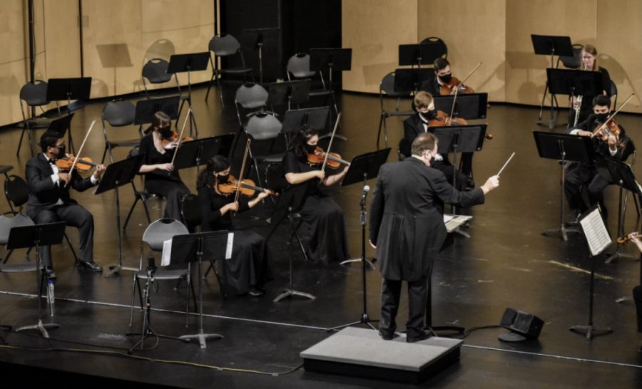 Dr. Brian St. John conducts the WKU Symphony at their Fall Concert at Van Meter Hall on Sept. 25, 2020. St. John, in discussion afterwards, said he told the performers that they should aim to play with the kind of sound they would want to hear if they were in the audience.