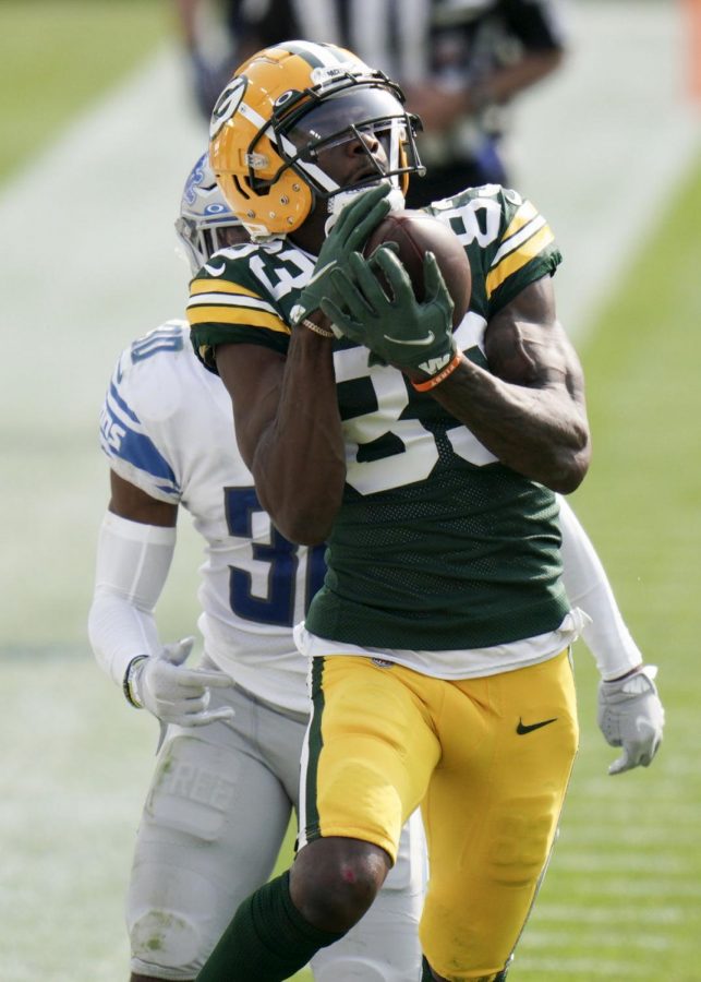 Green Bay Packers wide receiver Marquez Valdes-Scantling (83) hauls in a 41-yard pass in the 4th quarter. Detroit Lions cornerback Jeff Okudah (30) forced him out at the Detroit 27 yard line. The Green Bay Packers hosted the Detroit Lions at Lambeau Field Sunday, Sept., 20, 2020.