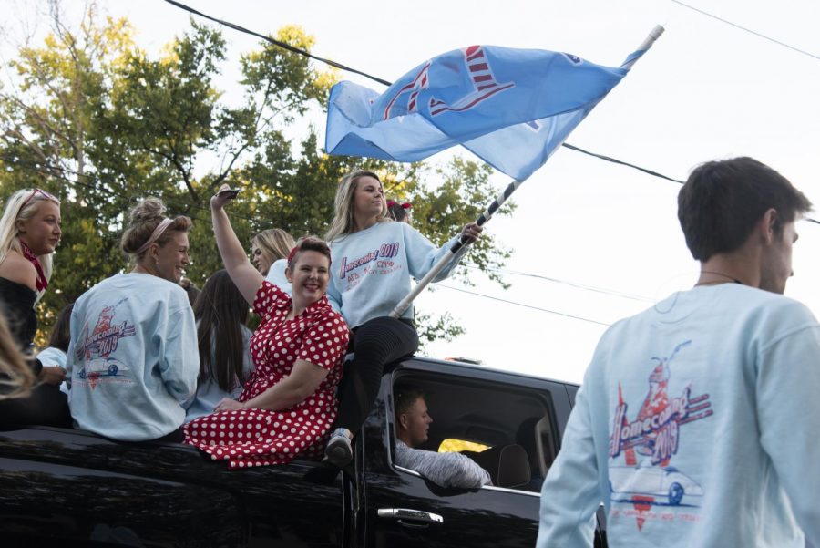 Members of Western Kentucky University’s Alpha Gamma Delta sorority ride along the route of the homecoming parade on October 18th, 2019. Many of Western Kentucky University’s sorority and fraternity chapters contributed to the homecoming parade by creating their own floats for the event.