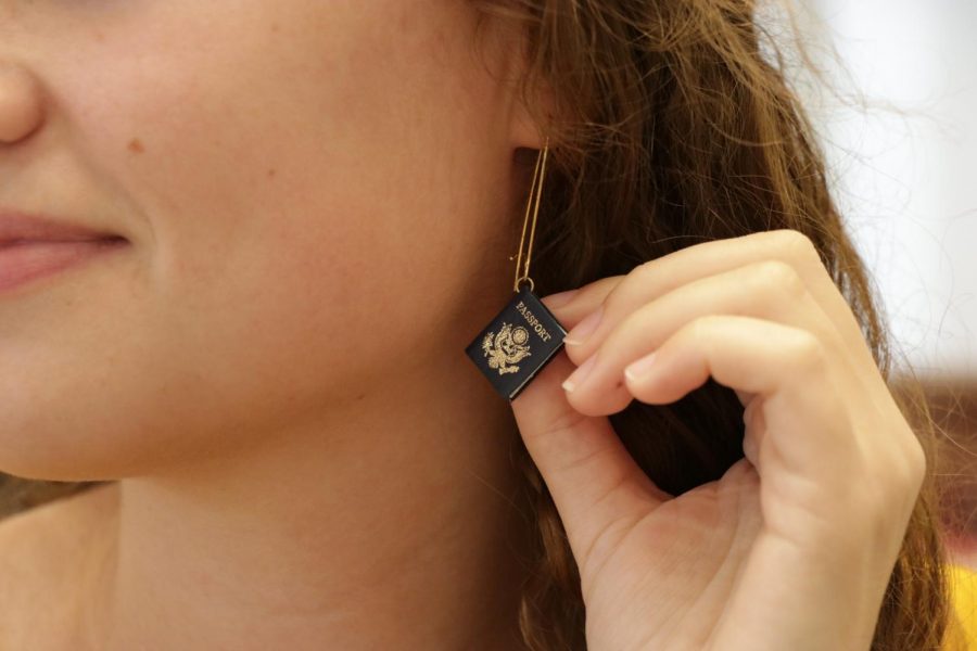 Zena Pare wears a pair of passport earrings given to her by her mother after she returned from her first Semester at Sea trip. Pare was planning on going on another study abroad trip next semester, this time to Paris, before the pandemic cancelled her plans.
