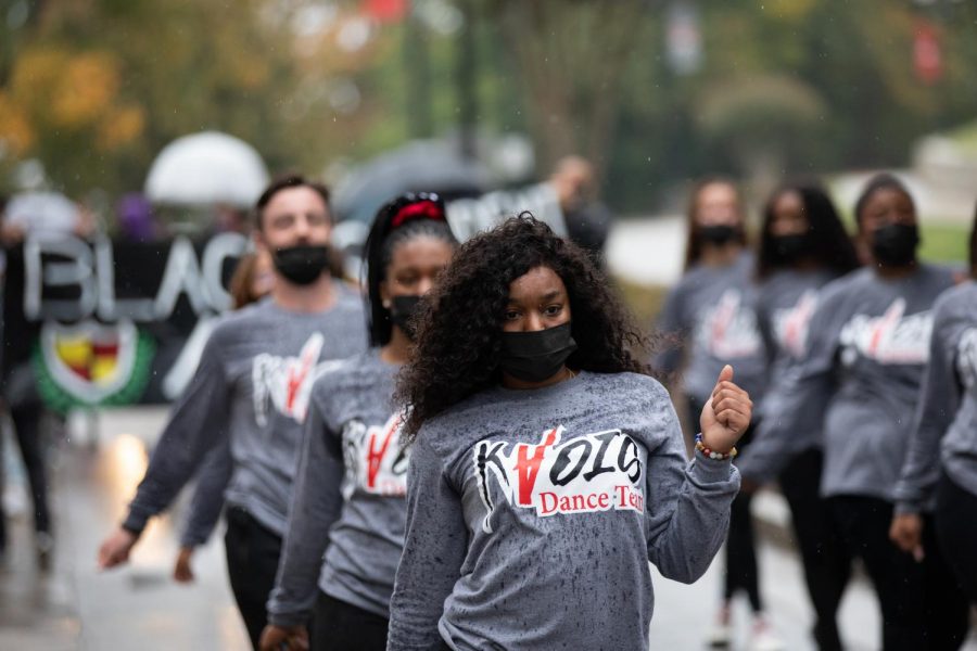 “Kaois” Dance Team member Marissa Williams dances down the hill towards E.A Diddle Arena during the ISEC homecoming parade on Friday, Oct. 9th, 2020. “I have always loved to dance and with us as a team being so family oriented it just means a lot,” Williams said.