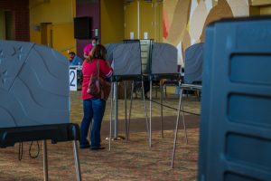 A voter at the poll during the early voting period in SKyPAC.