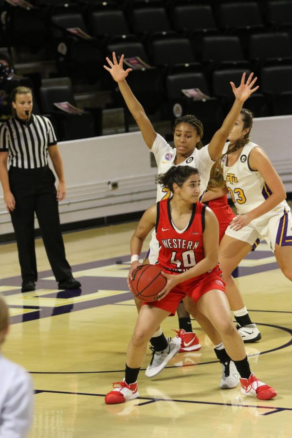 Junior Meral Abdelgawad looking for a pass on Dec. 20, 2020 at Tennessee Tech. The Lady Toppers went on drop the game 73-59.
