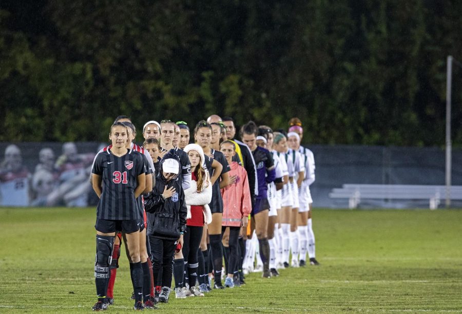 The WKU soccer team stands for the national anthem before the game against UAB at the WKU Soccer Complex on Friday, Aug 26, 2019.