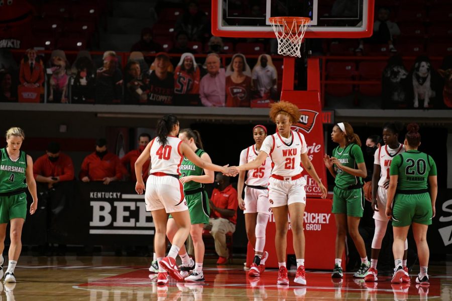 Junior Meral Abdelgawad (40) showing support to redshirt freshman Tori Hunter (21) on Jan. 17, 2021 in Diddle Arena. The Lady Toppers took down Marshall 69-60 to split the series. 