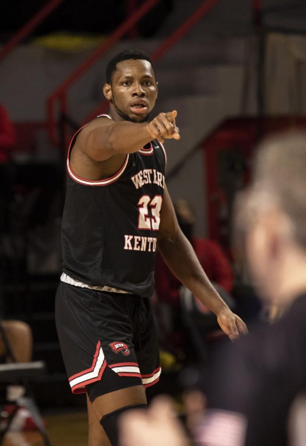 Junior Charles Bassey pointing to a teammate on Jan. 9, 2021 when WKU played LA Tech. The Hilltoppers lost 63-58 to the Bulldogs to split the weekend series.