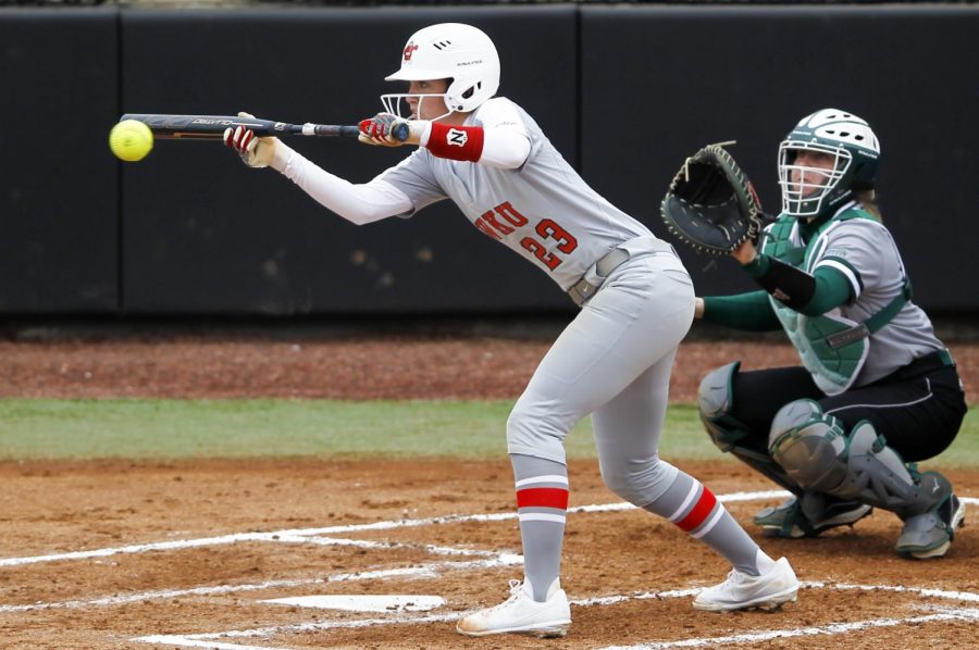 WKU+second+baseman+Morgan+Mcelroy+bunts+the+ball+while+at+bat+in+attempt+to+take+first+base+on+February+23%2C+2019.+WKU+defeated+the+University+of+Wisconsin-Green+Bay+3-0.