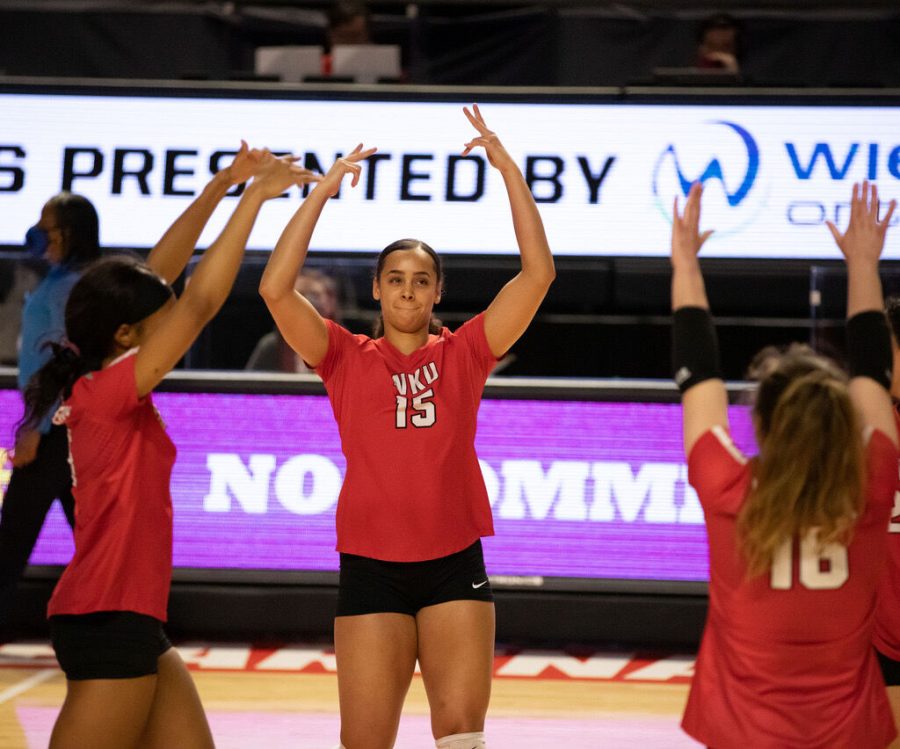 Lady Topper senior Kayland Jackson celebrates with her teammates after a big kill against University of Evansville Purple Aces on Jan. 31, 2021. 