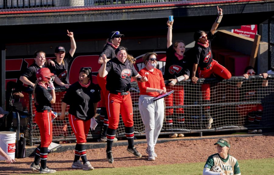 WKU players celebrates after WKU infielder, Taylor Sanders (15) hit a homerun during the game against UAB Saturday, March 20, 2021. 