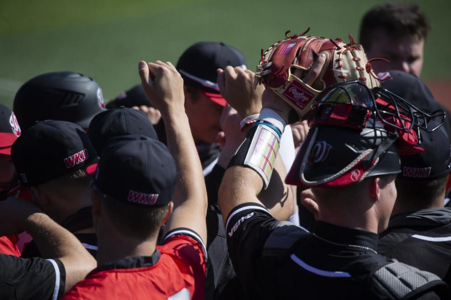 The+WKU+Baseball+team+huddles+up+prior+to+the+first+Conference+USA+series+against+Charlotte+on+March+26%2C+2021.%C2%A0