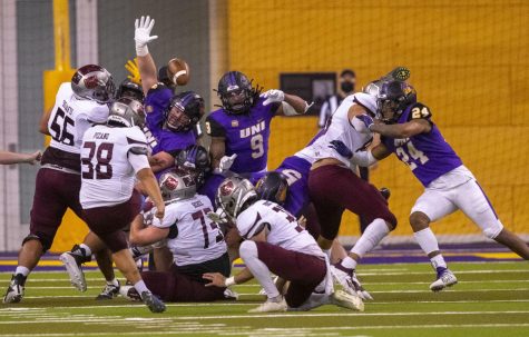 Northern Iowas defenders attempt to block a field goal kick from Missouri State University on Saturday at the UNI-Dome in Cedar Falls.