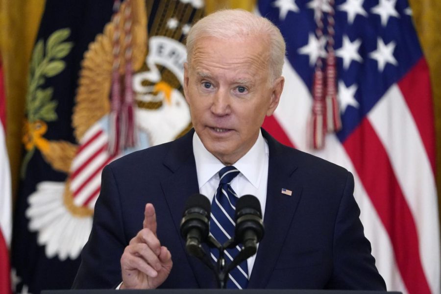 Biden sets new vaccine target, faces questions on border crisis, Senate filibuster