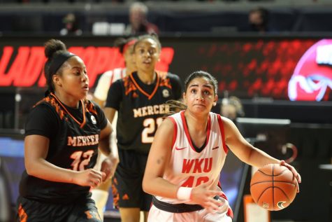 Western Kentucky University Junior Guard Meral Abdelgawad drives to the basket during The Hilltoppers 71-54 loss to Mercer College on December 18, 2020 at the EA Diddle Arena in Bowling Green, KY.