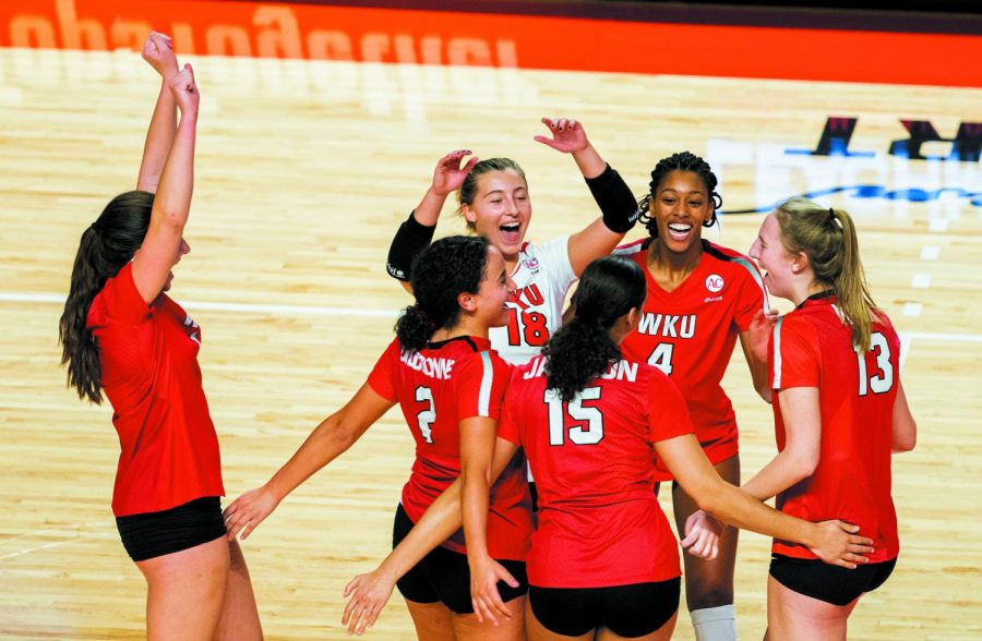 WKU+Volleyball+team+celebrates+during+their+game+against+Evansville+on+Sunday%2C+Jan.+31%2C+2021+in+Diddle+Arena.