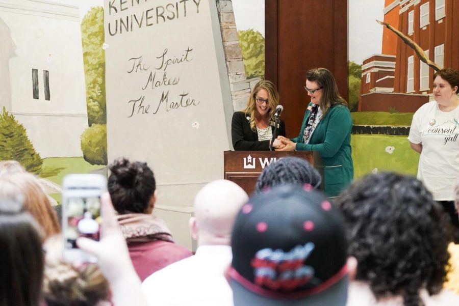Melissa Whitley, the executive director of Hope Harbor and Dr. Peggy Crowe, the director of counseling and testing center at WKU sign proclamation to kick off the honorary sexual assault prevention month of April on the first floor of DSU on Tuesday, March 26, 2019.