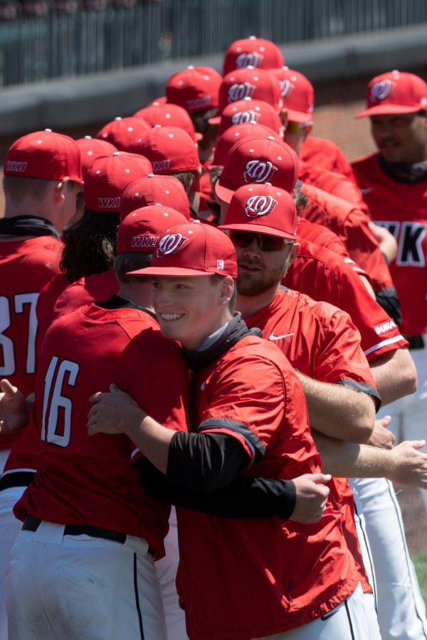 The+WKU+Hilltoppers+baseball+team+embrace+one+another+before+their+game+against+Marshall+College+on+April+11%2C+2021+at+Nick+Denes+Field+where+WKU+won+8-1.