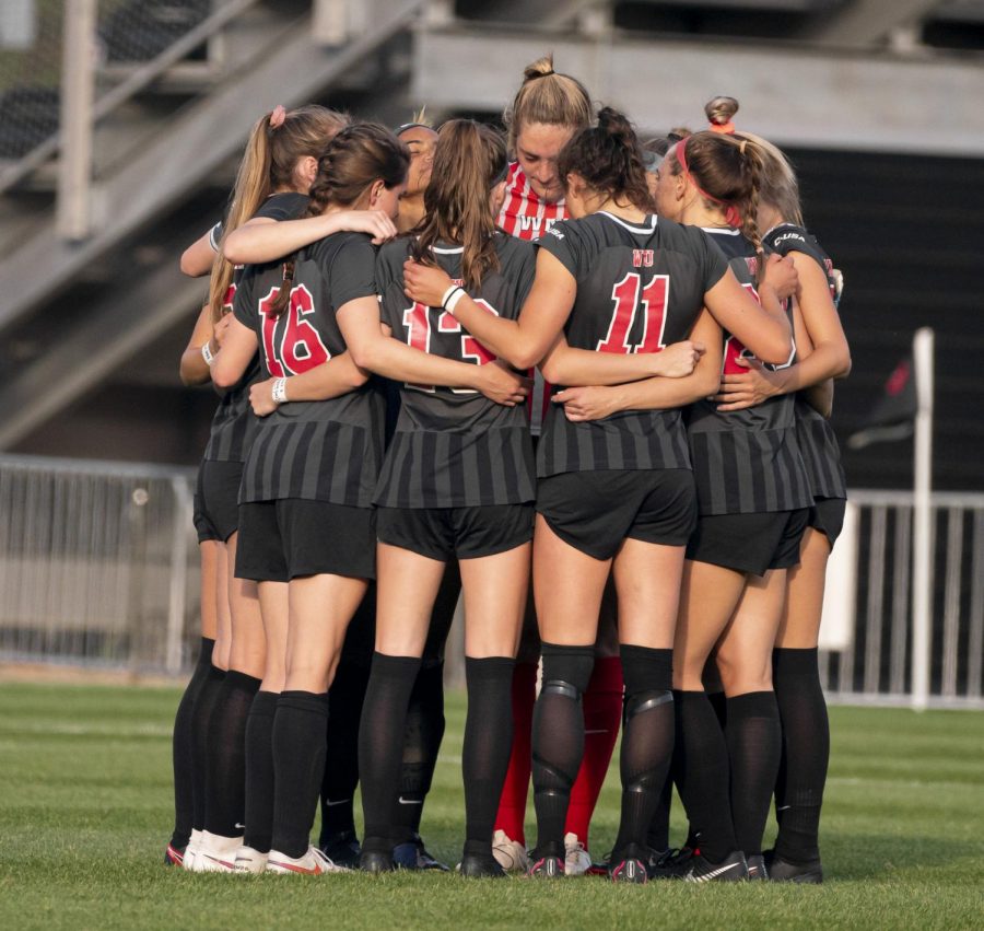 WKU+soccer+players+huddled+up+prior+to+kickoff+against+Charlotte+on+Friday%2C+April+9%2C+2021.%C2%A0