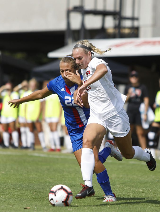 WKU Lady topper forward Ansley Cate (20) advance towards the box while being defended by Louisiana Tech Forward Kaylee Zettler (22) during the game at the WKU Soccer Complex on Sunday Sept. 29, 2019.
