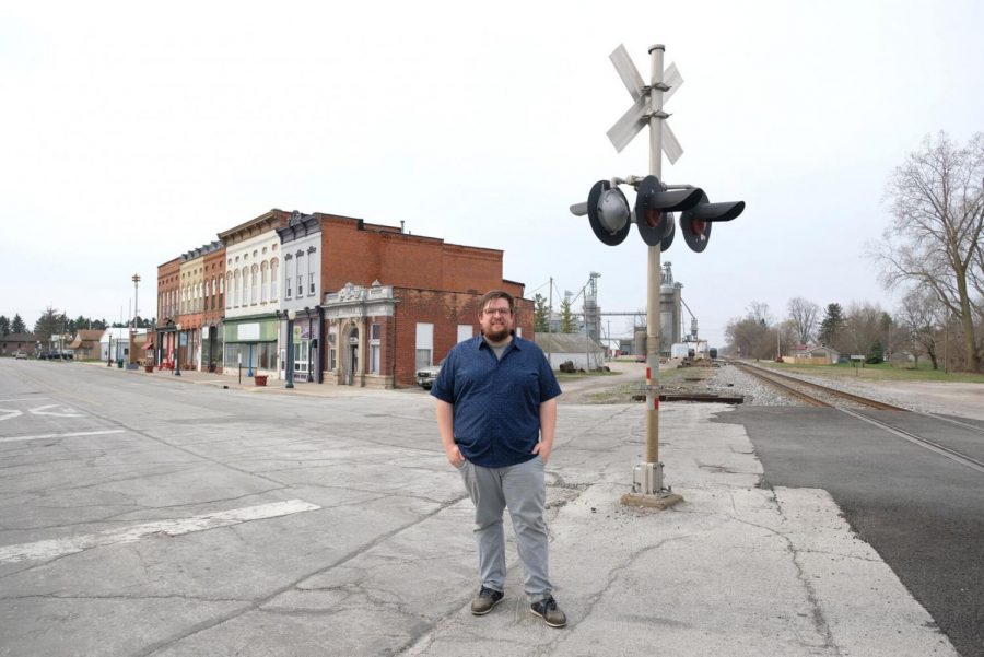 Weston Mayor Jeremy Schroeder stands near the railroad tracks that run through the village.