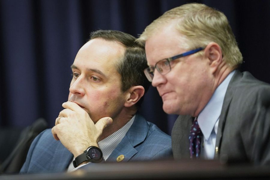 Kentucky Republican state Sen. Chris McDaniel, left, sits with fellow Sen. Damon Thayer during a State and Local Government Committee meeting at the state capitol in Frankfort, Ky., on Wednesday, Feb. 19, 2020.