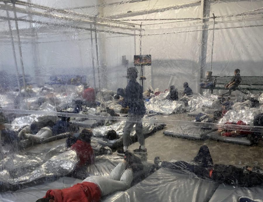 This March 20, 2021, photo provided by the Office of Rep. Henry Cuellar, D-Texas, shows detainees in a Customs and Border Protection (CBP) temporary overflow facility in Donna, Texas. President Joe Biden's administration faces mounting criticism for refusing to allow outside observers into facilities where it is detaining thousands of immigrant children.