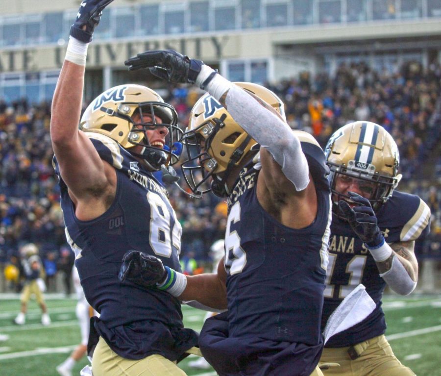 Montana State wide receivers Lance McCutcheon, right, and Peyton Hanser celebrate a touchdown by McCutcheon against UAlbany in 2019 during the FCS playoffs at Bobcat Stadium.