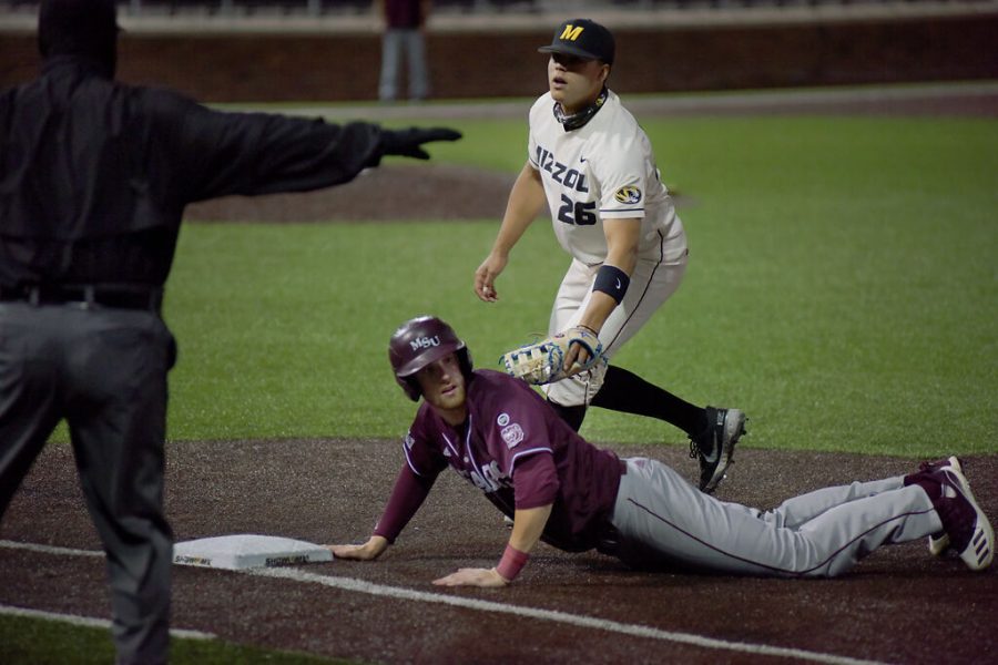 Missouri first baseman Torin Montgomery, top, attempts to tag out Missouri State batter Ben Whetstone on Tuesday in Columbia. The Tigers fell to the Bears 7-5.