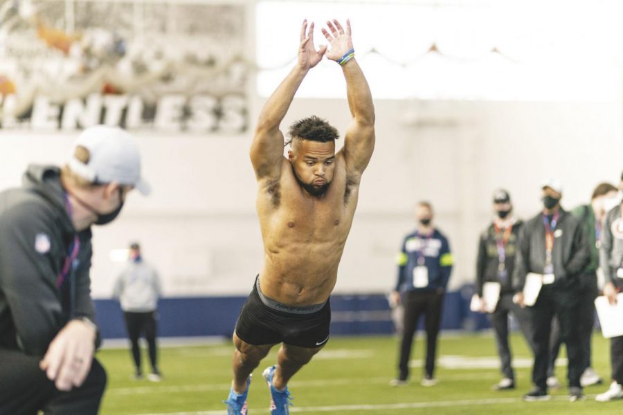 Former Boise State football player Avery Williams participates in a jumping drill Wednesday in front of NFL teams at Pro Day at Boise State University.