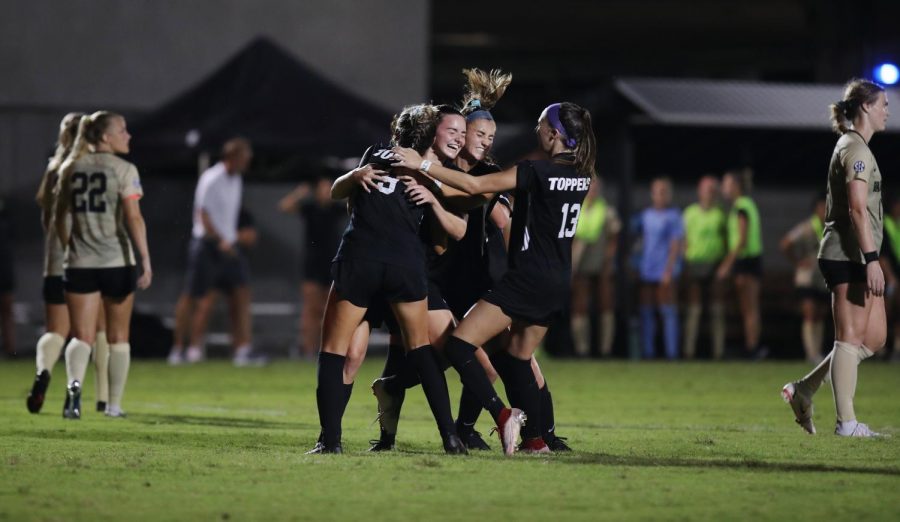 Western Kentucky University Lady Toppers celebrate after Brina Micheels scores the winning goal on a penalty kick against the Vanderbilt Commodores on Thursday Aug. 26, 2021. The Lady Toppers defeated Vanderbilt 3-2.