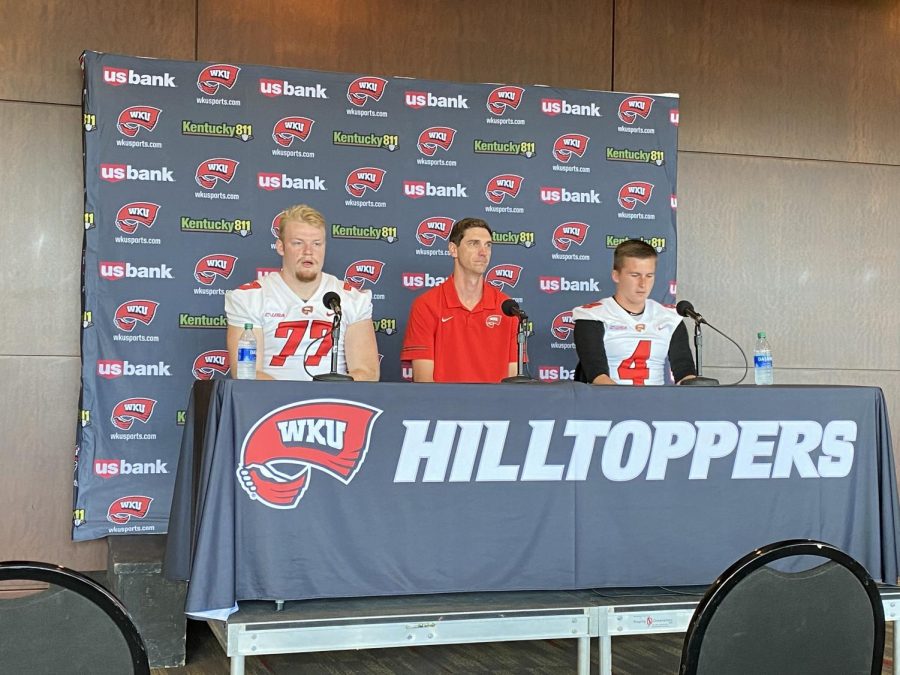 Offensive lineman Mason Brooks (left), offensive coordinator Zach Kittley (center) and quarterback Bailey Zappe (right) field questions from reporters during WKU's media day.