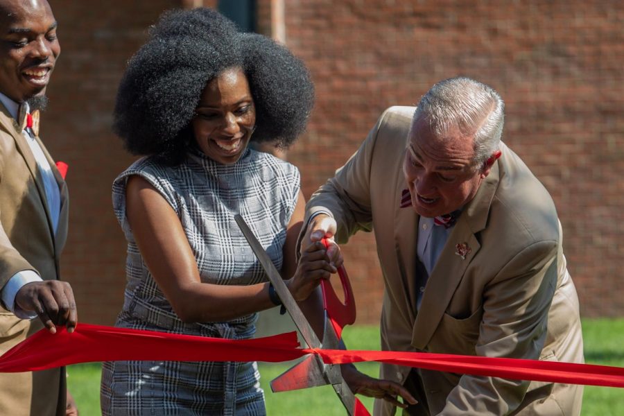 In the morning of Aug. 28, 2021, President Caboni excitedly cuts the ribbon recognizing The Jonesville Academy’s establishment on Western Kentucky University’s campus while Tyreon Clark holds the ribbon cutting with students assisting on both sides. 