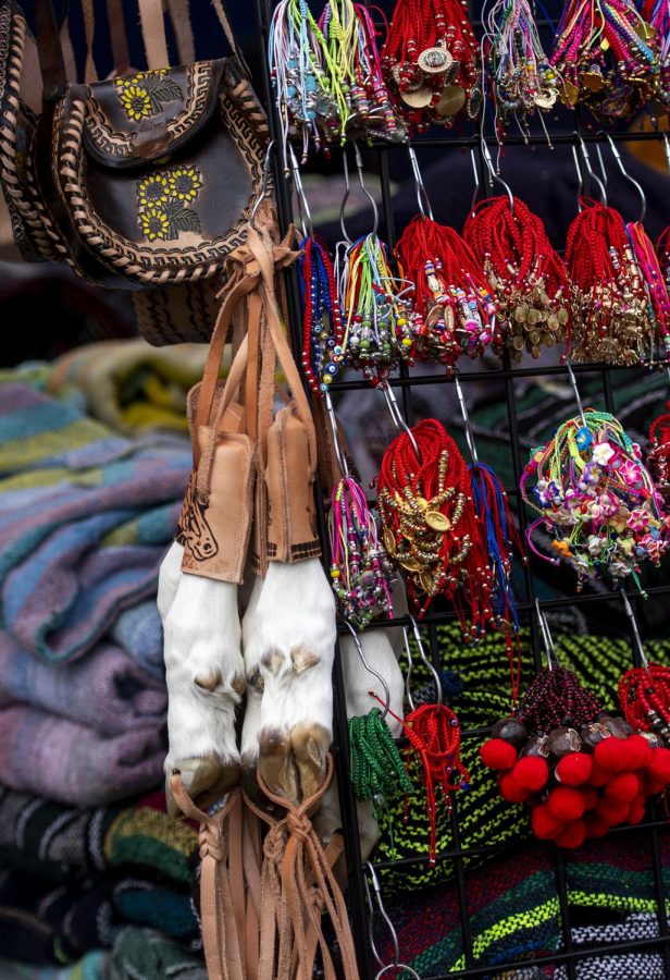 Animal hooves along with bracelets, purses, and other items are sold at a booth at the International Festival.