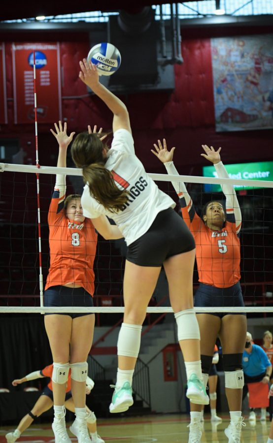 WKU Hilltoppers outside hitter Paige Briggs (1) jumps for spike against UT Martin in a 2021 contest.