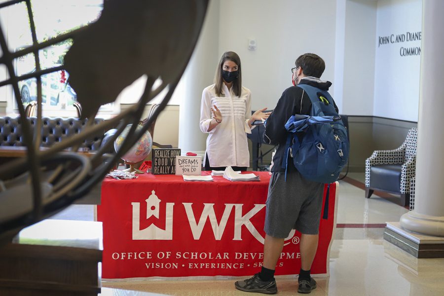 Lindsey Houchin, WKU’s coordinator of nationally competitive opportunities, informs a student of scholarships available for the WKU Study Abroad program at the annual Fall Study Abroad Fair on Tuesday, Sept. 14, 2021.
