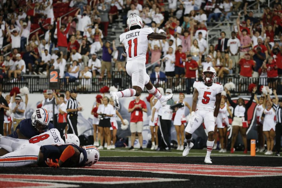 WKU wide receiver Malachi Corley (11) celebrates scoring a touchdown during the Hilltoppers season-opening 59-21 win over UT Martin on Sept. 2, 2021. 