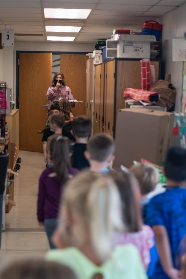Art Education Student Jaci Bolin serves as a substitute art teacher at Rich Pond Elementary school in Bowling Green, Kentucky.

Here, Jaci instructs her kindergarteners to line up quietly as class ends.