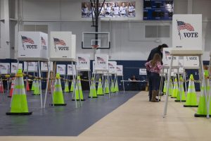 A voter fills out her ballot in the Warren Central High School gym on the afternoon of Nov. 3, 2020.