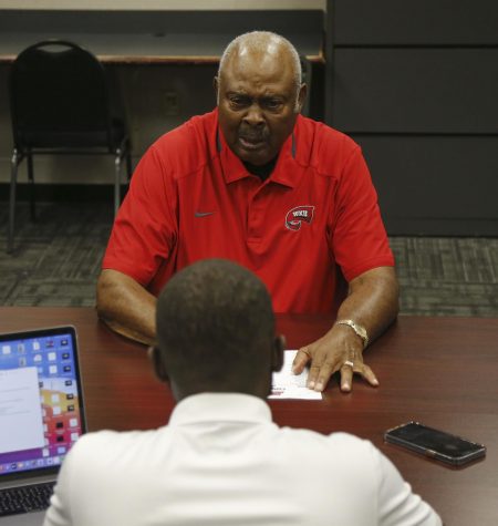 Former Western Kentucky University basketball player Clem Haskins is interviewed by Kaden Gaylord-Day in Diddle Arena on Oct. 6, 2021. Haskins, along with teammate Dwight Smith, became the first African-American athletes to integrate WKU’s basketball program in the fall of 1963.