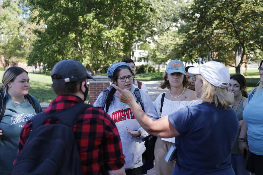 Students speak to a representative of the anti-abortion protesters on Oct. 21, 2021.