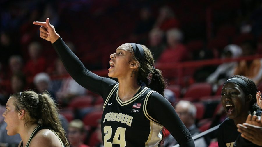 Purdue Boilermakers’ sophomore center Ra Shayla Kyle (24) WKU Lady Hilltopper fans cheers from the sideline after her teammate makes a shot against the WKU Lady Hilltoppers in Diddle Arena on Wednesday evening, Nov. 10 of 2021. Western lost the match 79-69.