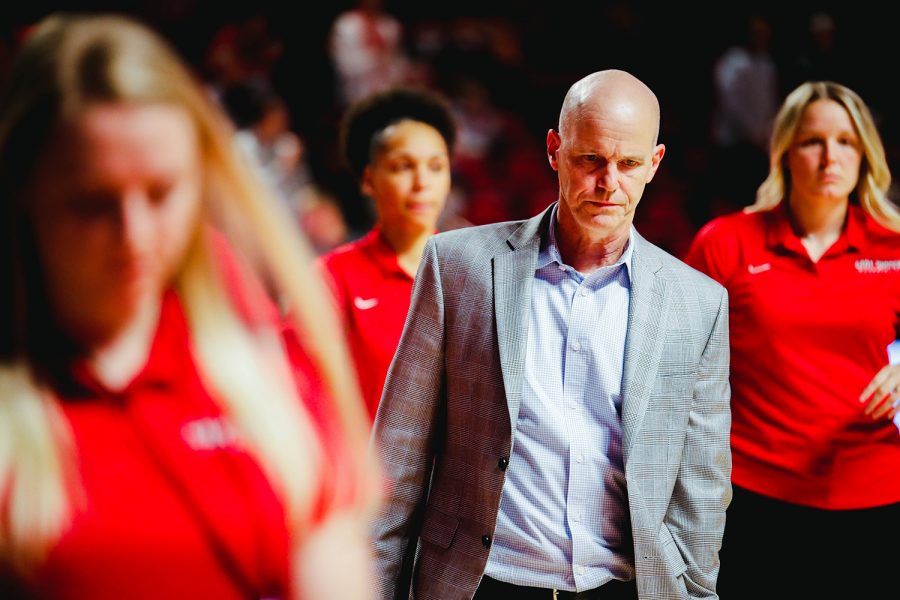 Lady Topper’s Head Coach Greg Collins walks with his coaching staff to the locker room at the start of the halftime break during their game against the Purdue University Boilermakers in Diddle Arena on Nov. 10, 2021.