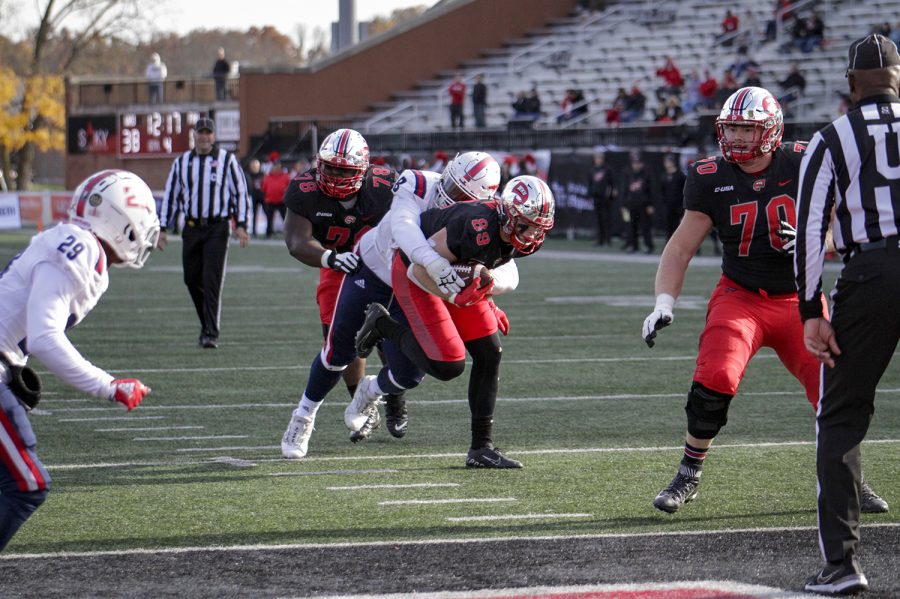 Hilltoppers’ sophomore tight end Joey Belgian (89) fights though the FAU Owl’s defense to score a touchdown.
