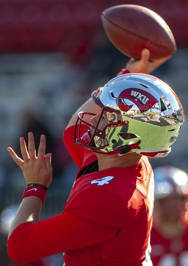 WKU Hilltoppers quarterback Bailey Zappe (4) warms up before the game November 6, 2021.