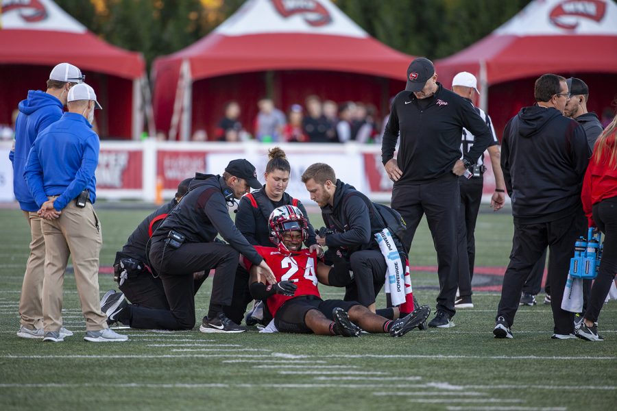 WKU Hilltoppers redshirt senior linebacker Malik Staples (24) is helped up after an injury in the Saturday afternoon game.
