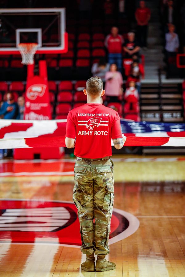 WKU Army JROTC Cadets hold the American flag during the national anthem in Diddle Arena before the WKU vs. Alabama State University Hornets on Nov. 9, 2021.
