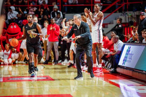 Hilltoppers’ head coach Rick Stansbury makes a calming motion to his players during the final seconds of their game against the Alabama State University Hornets at Diddle Arena on Nov. 9, 2021.